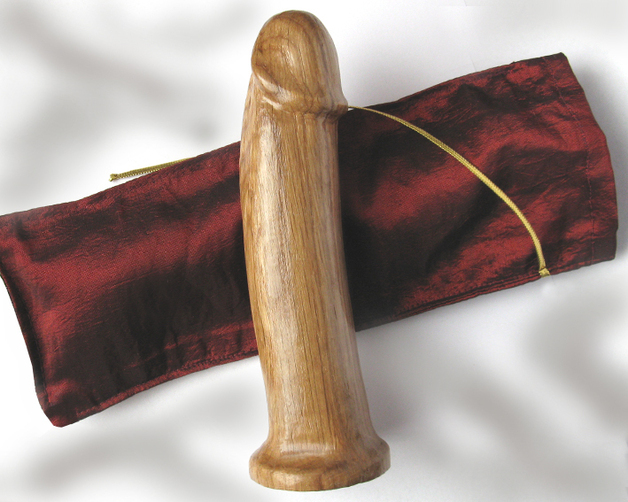 This is such a beautiful object. So smooth, so hard, so artfully crafted. It has just the right size to perfect my fellatio techniques. I cover it with my saliva, licking it passionately over its whole length before pushing it into my mouth and sucking on it, curling my tongue around it.
