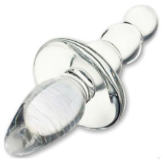 With my throat a bit sore after so much abuse I give me a bit of rest with this glass dildo. I do not attempt to deep-throat it. I only suck on it, lick it as though it were a real cock, moving it in and out of my welcoming mouth.