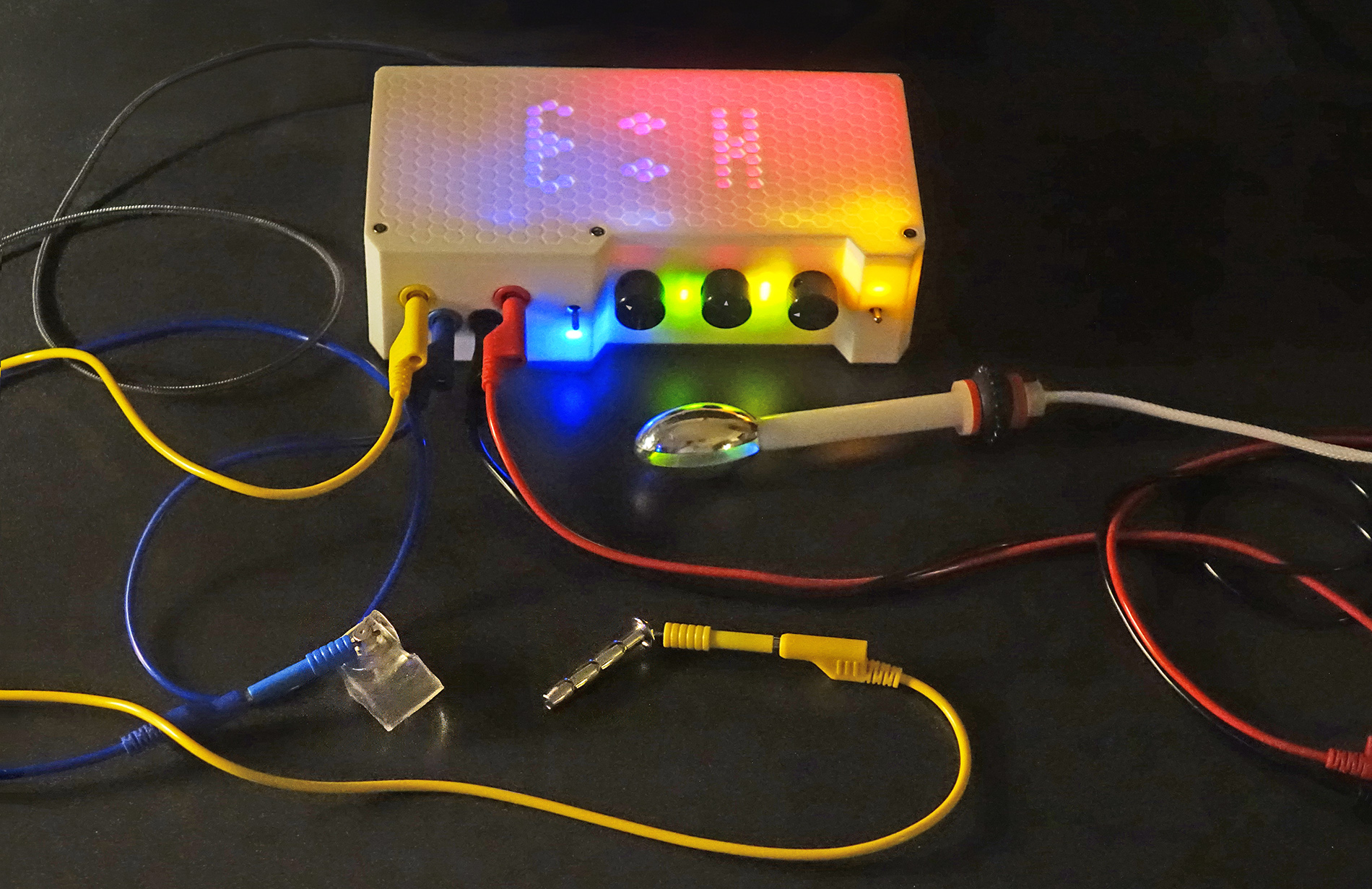 Here, the Estim Hero is powered up, showing the internal LEDs